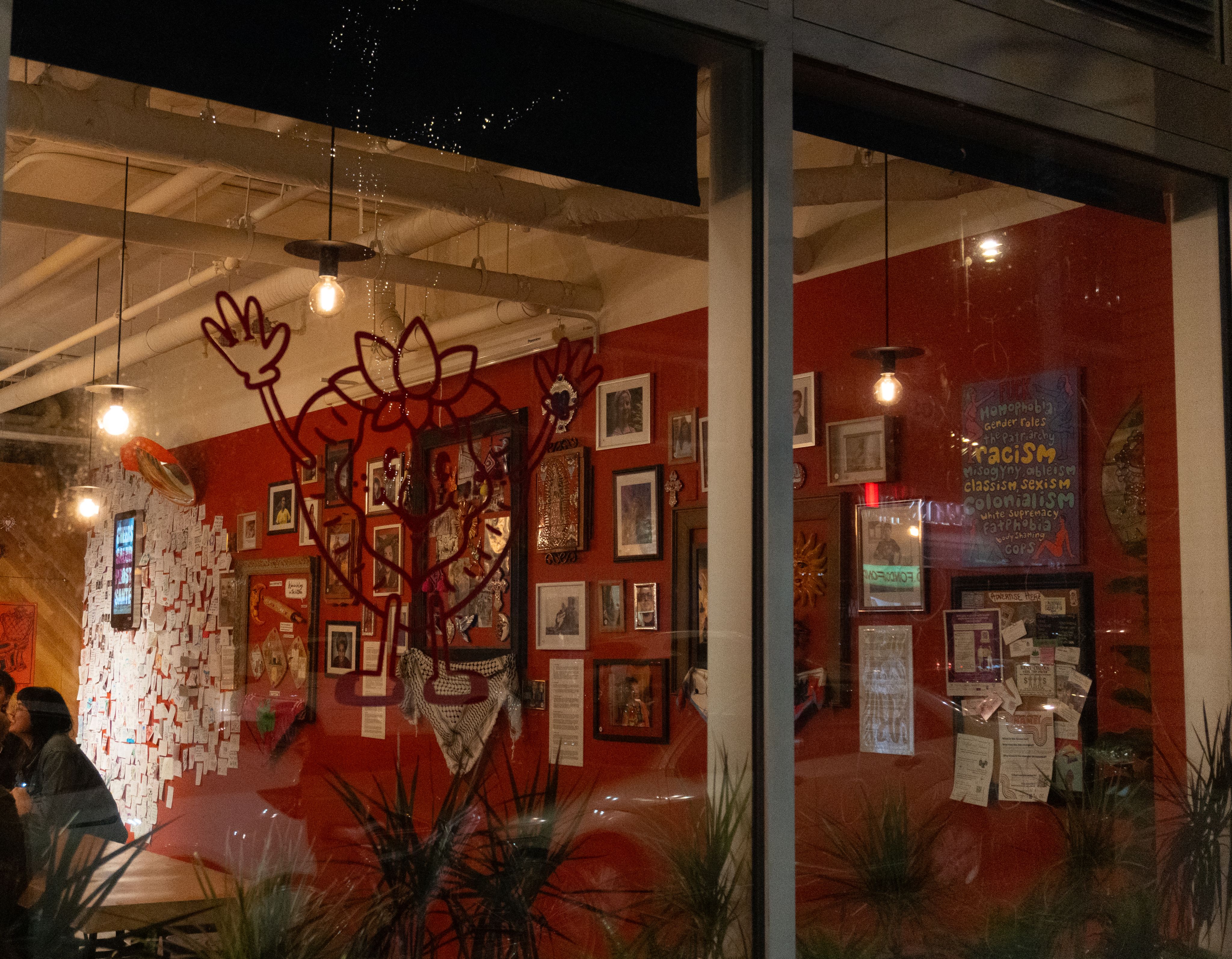 Gina's red strawberry logo