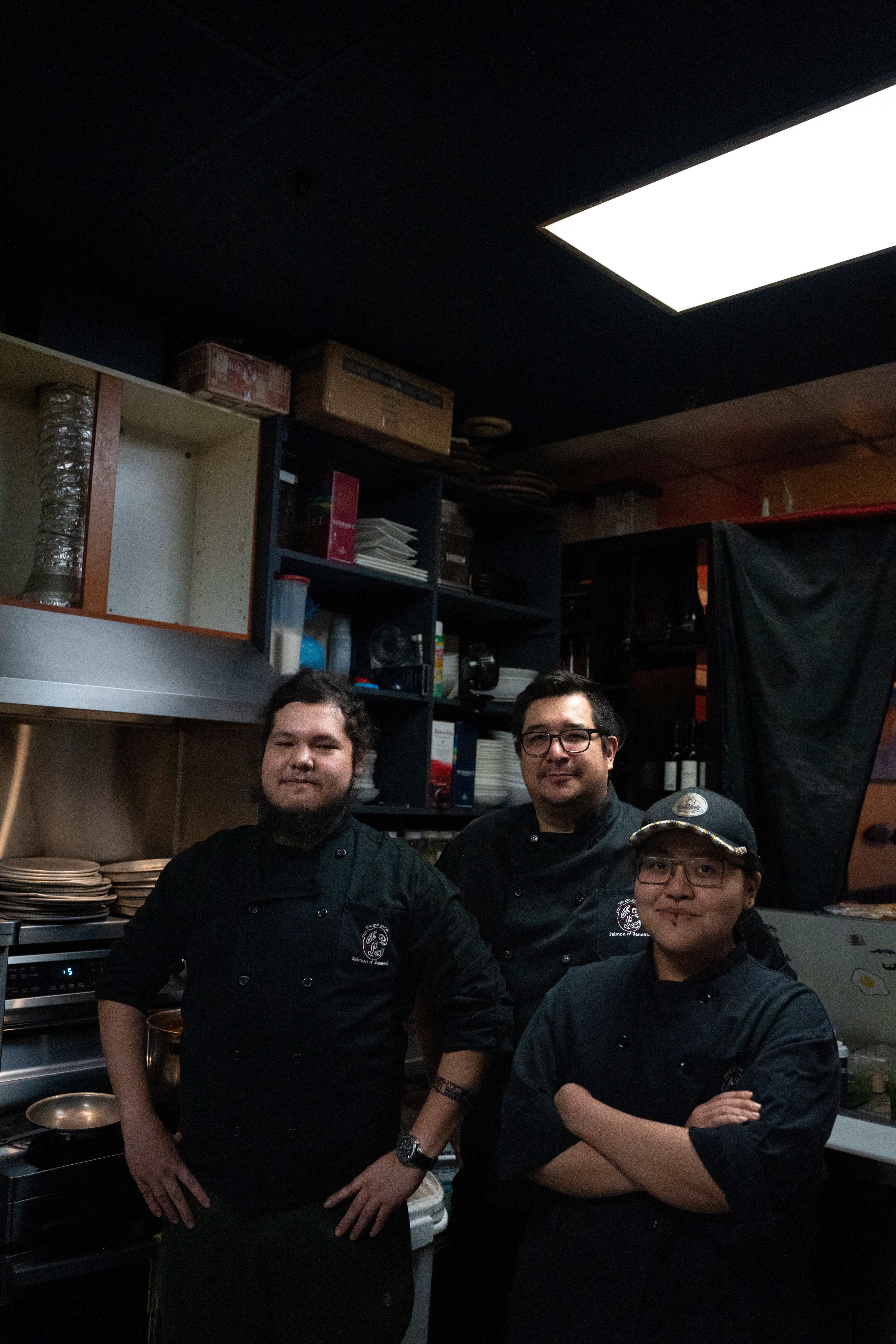 From left to right: chef Ryan Cartier, kitchen manager & chef Paul Fortin, and chef Laurie Sampare at the kitchen at Salmon n' Banock